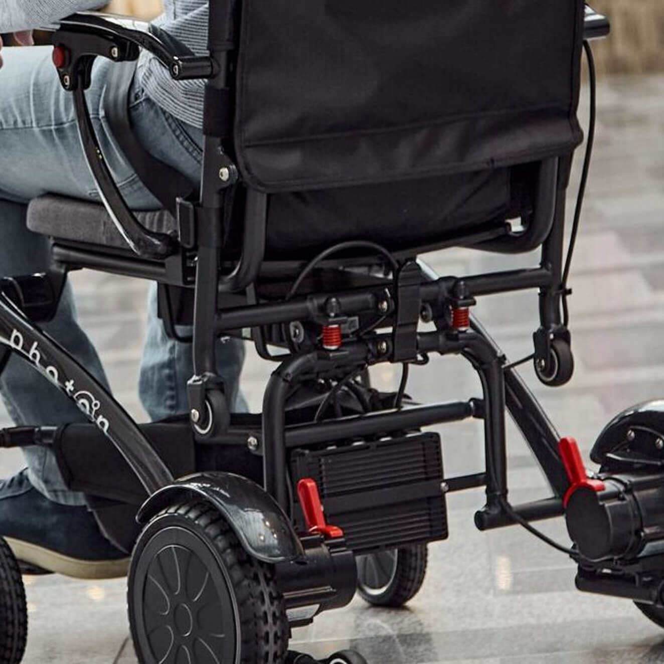 Anti-flex seat system of a Photon lite powerchair