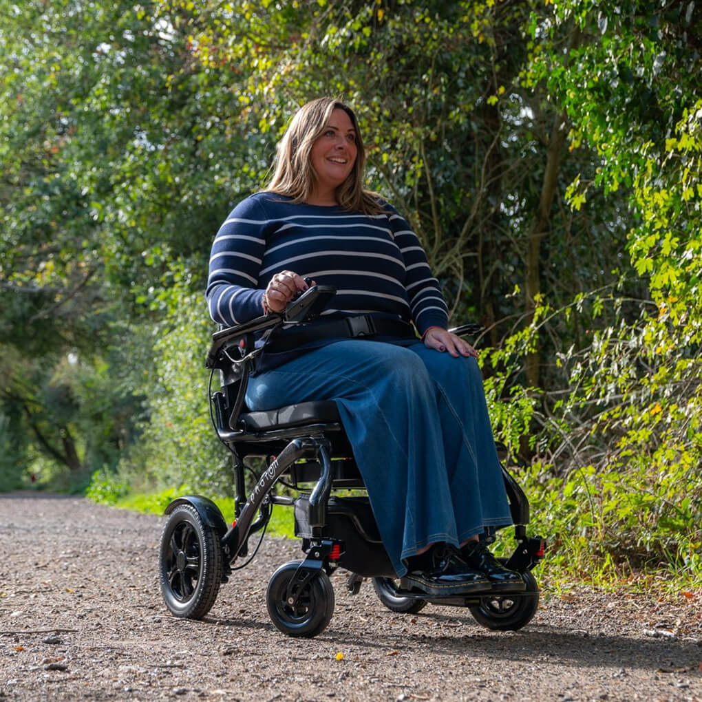A woman on a Photon powerchair